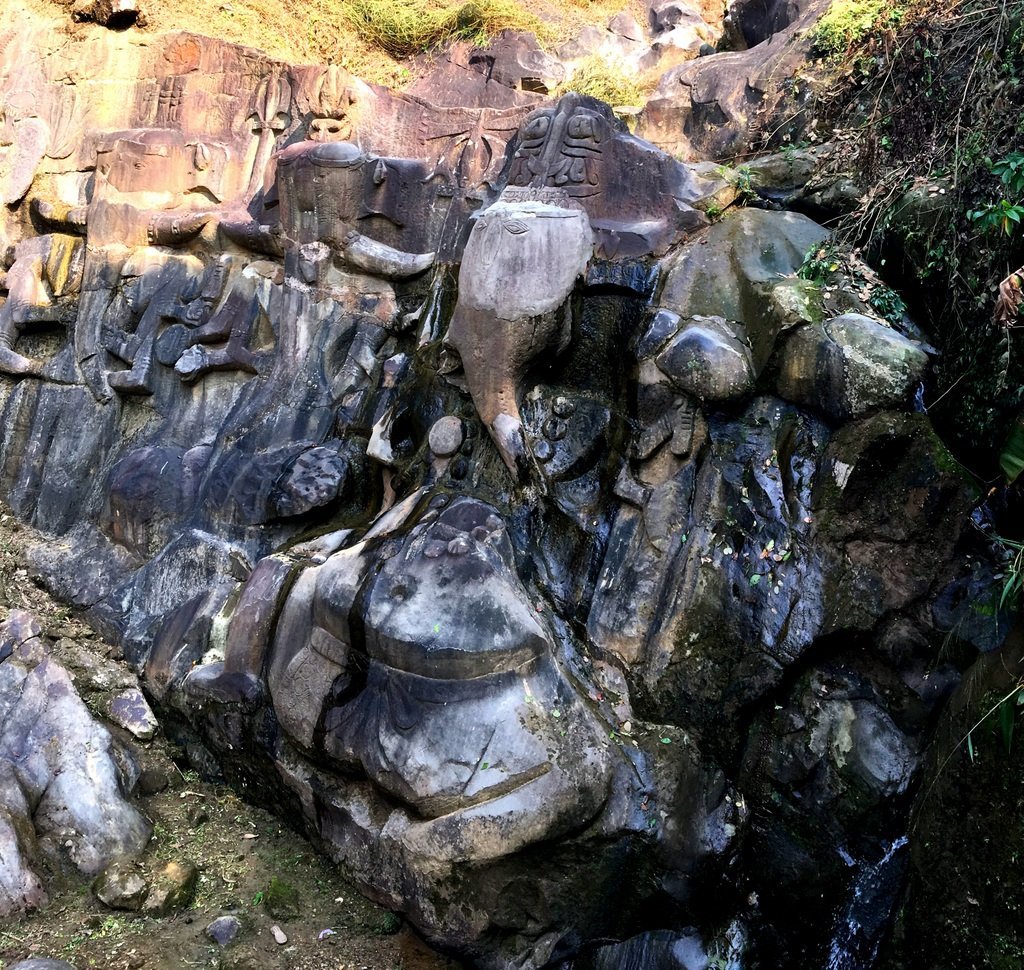 Genesh Ji carving on rock at unakoti