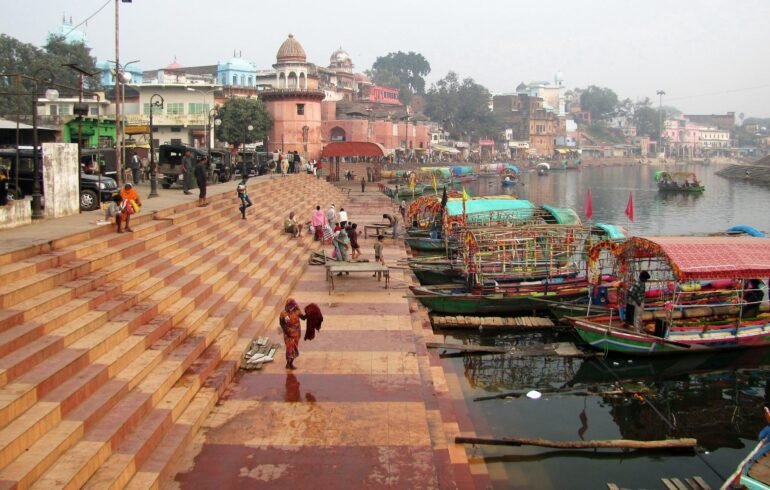 A holy ghat on the banks of the Mandakini River, ideal for spiritual rituals and witnessing the evening aarti.