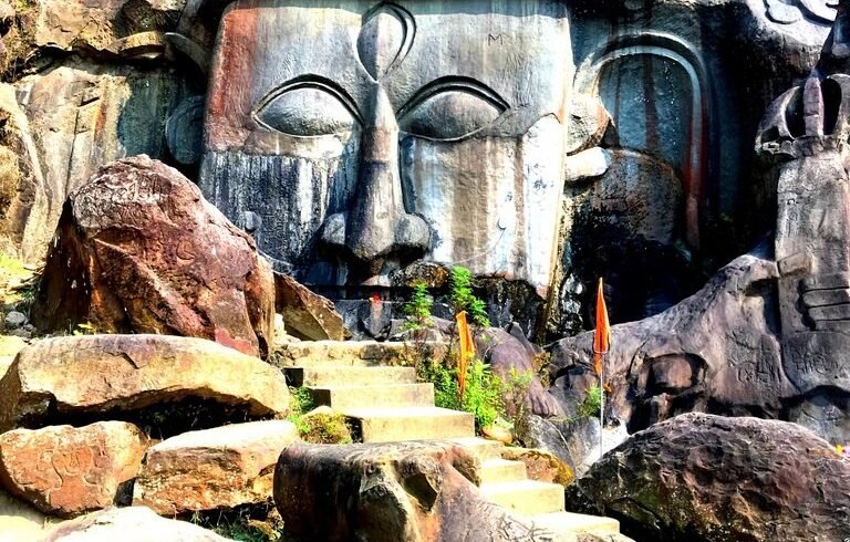 Budhha carving on rock at unakoti